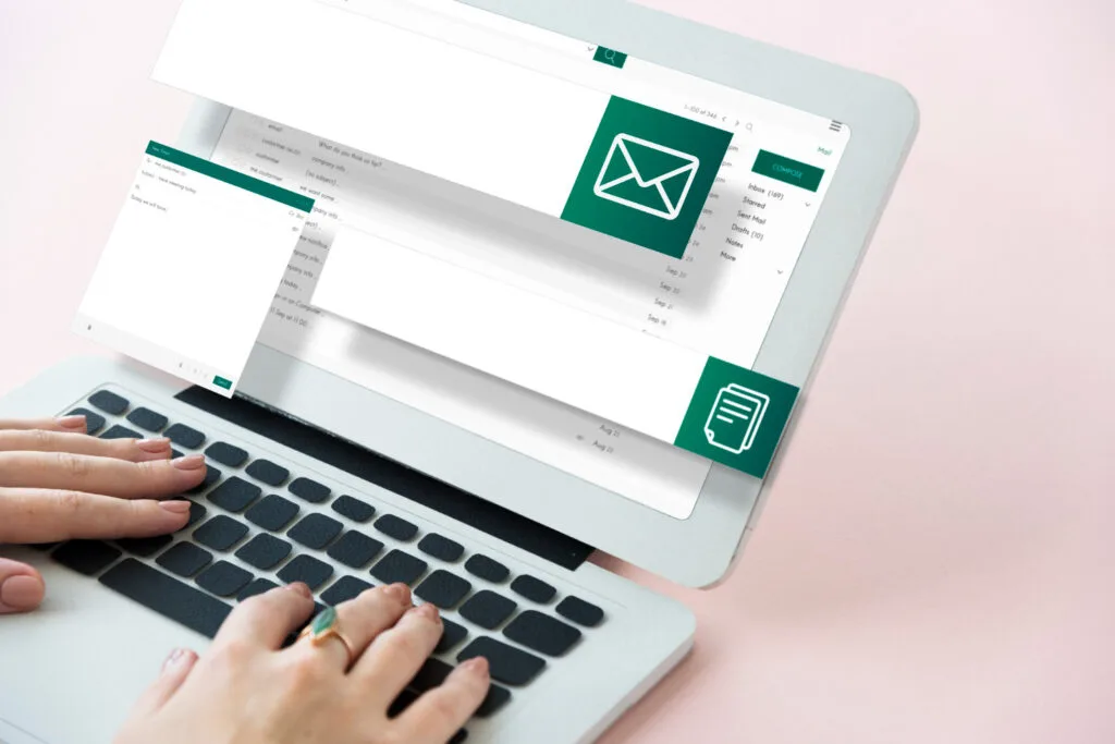 working on a cold email sofware using a laptop
