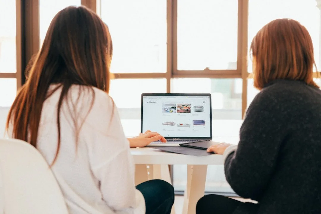 Two marketing professional using newsletter software for restaurant newsletters