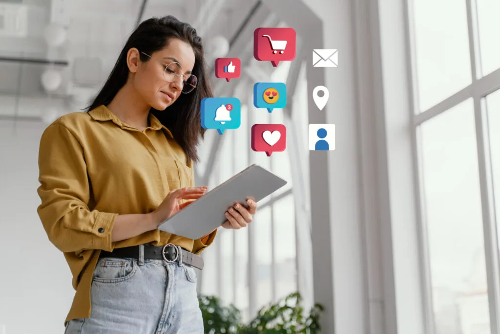 woman using tablet for social media
